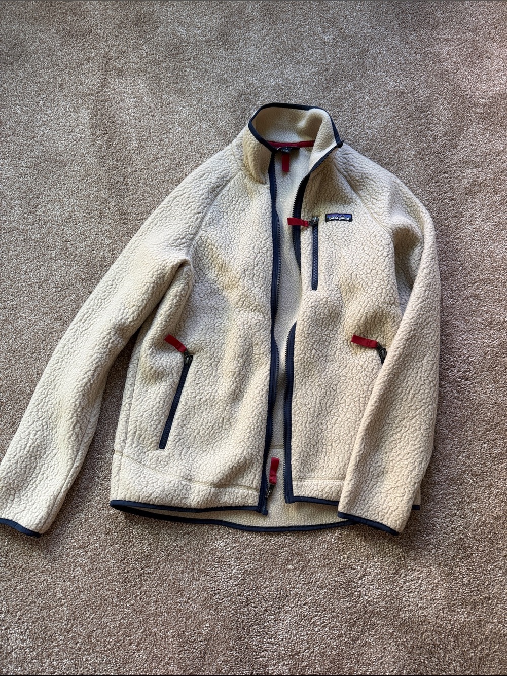 Patagonia Men’s Cream Sherpa Jacket with Navy Trim and Red Accents